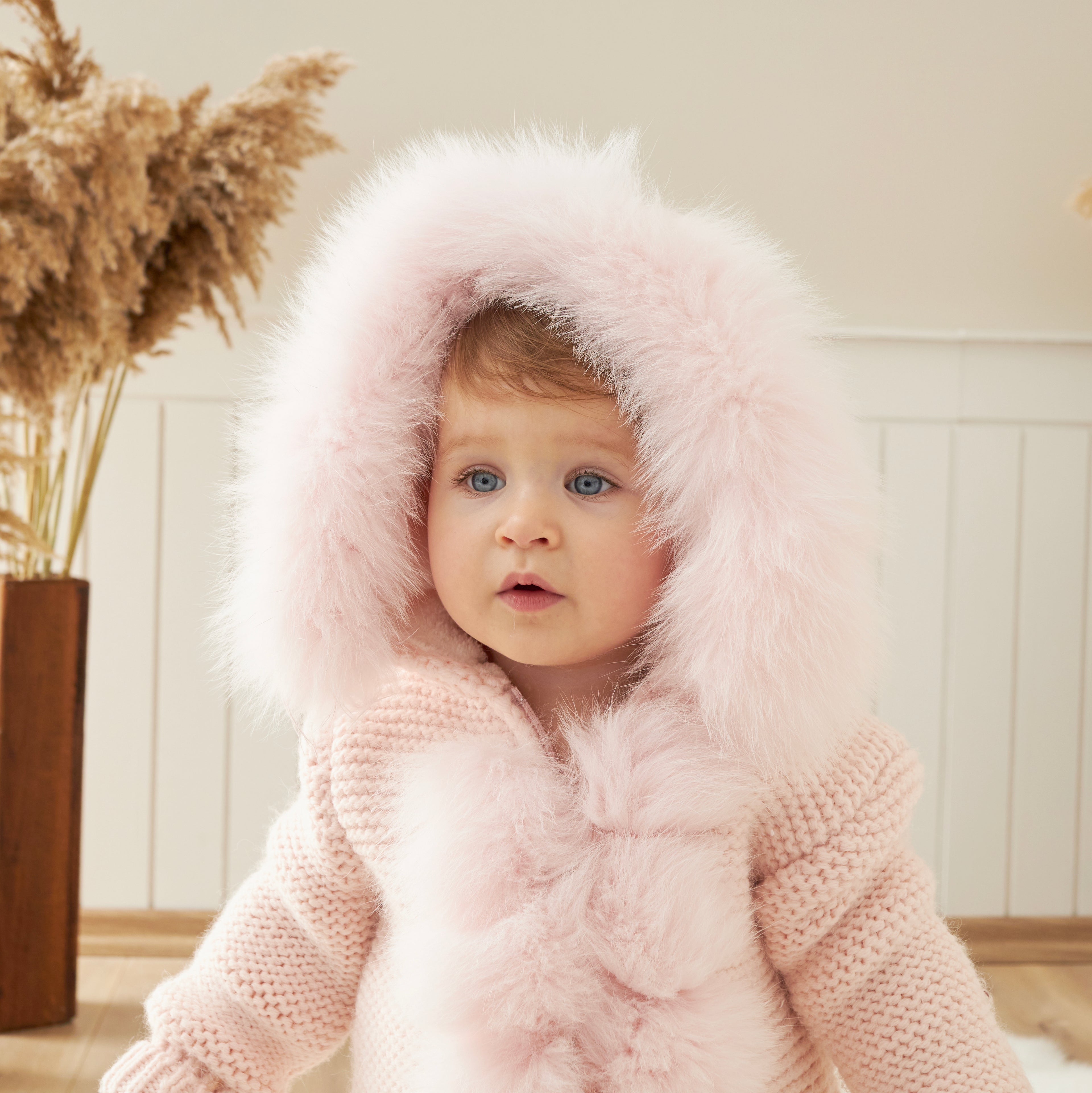 Luxury Baby Knit Romper with Faux Fur Hood – Soft Blush Pink
