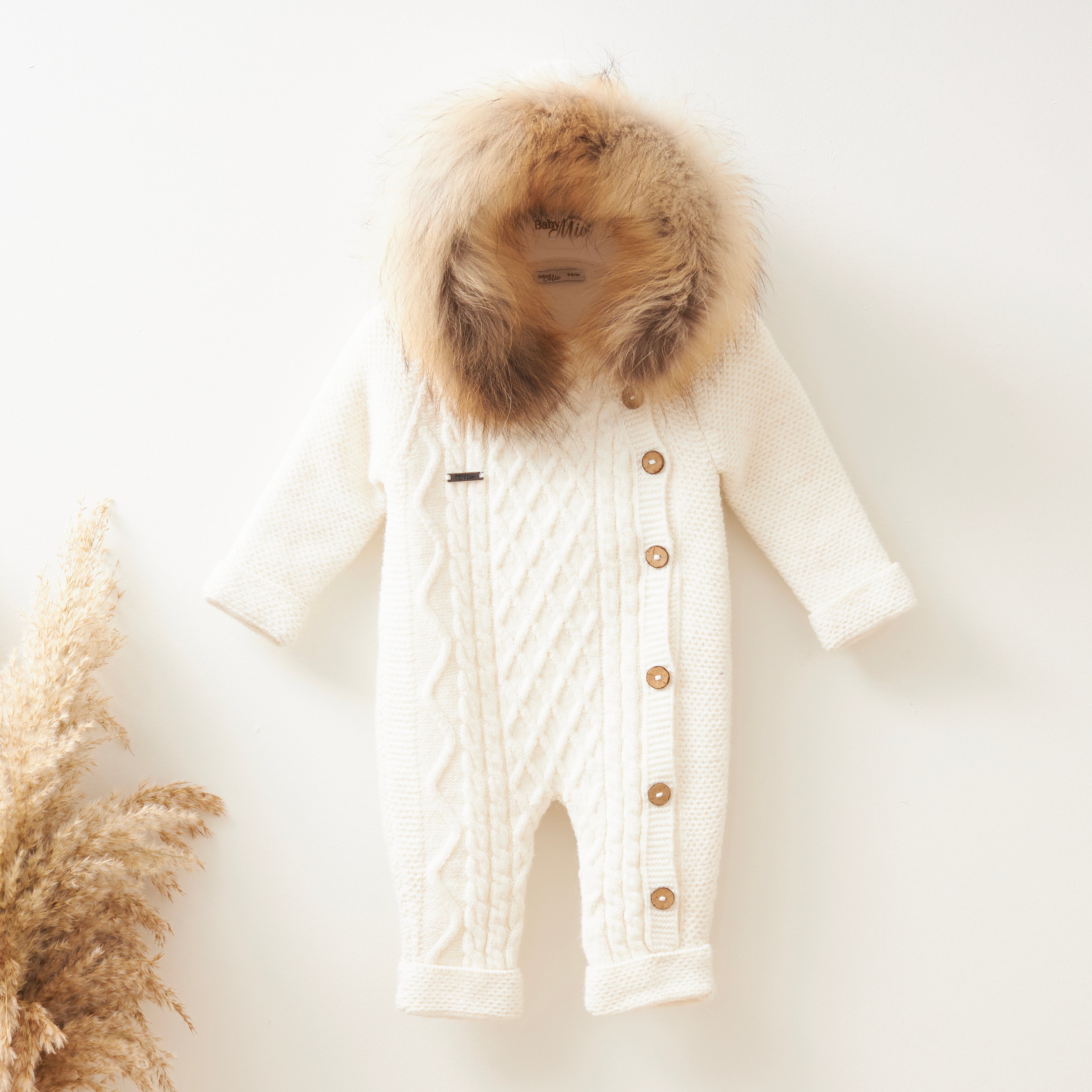 Cozy Knit Baby Jumpsuit with Fur Hood – Cream